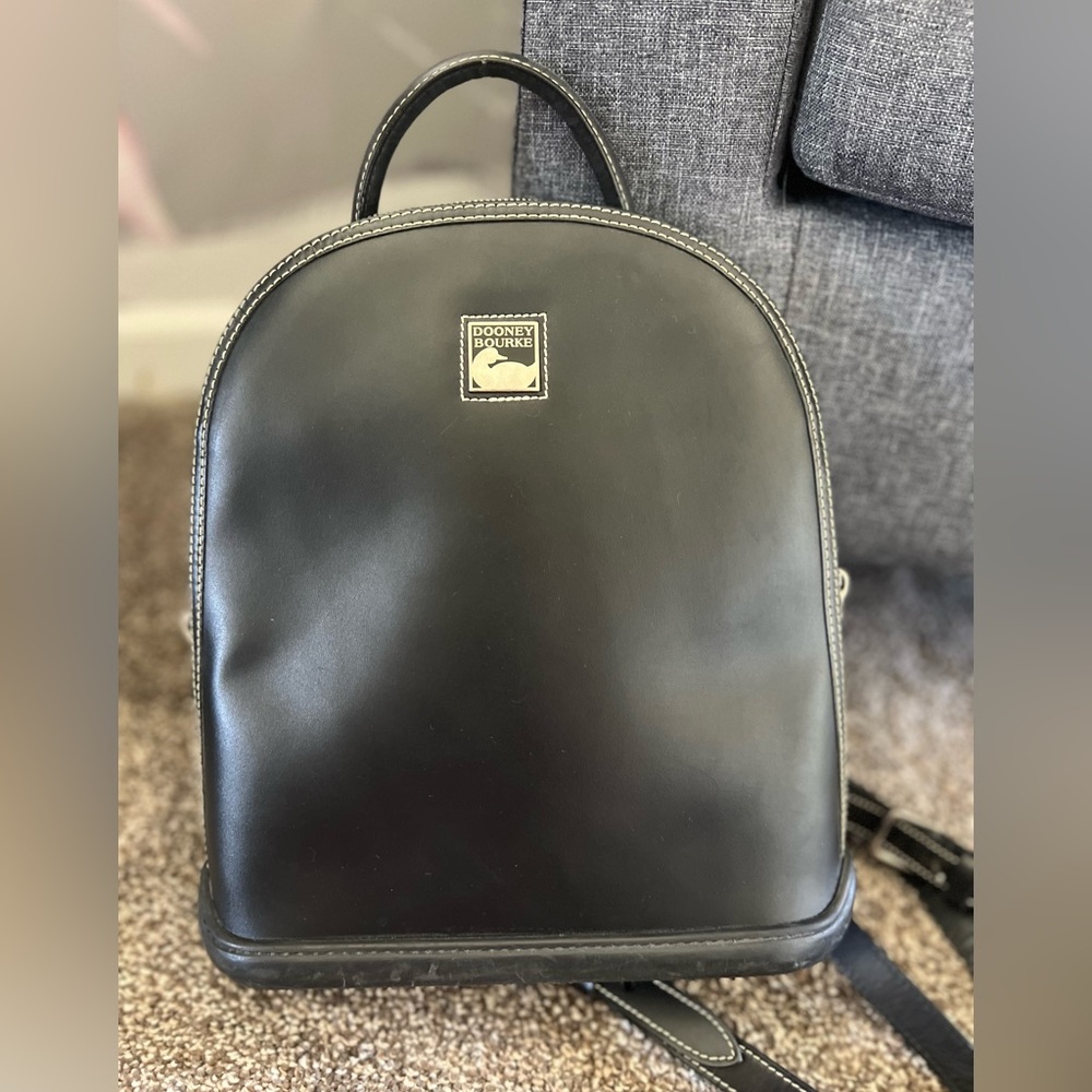 Vintage Dooney & Bourke black leather backpack purse in great condition!